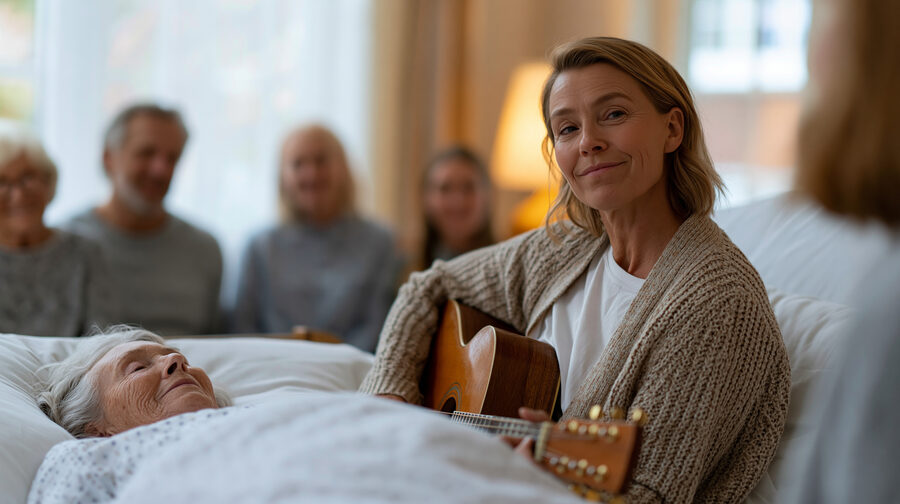 Music therapist playing live at a patient bedside